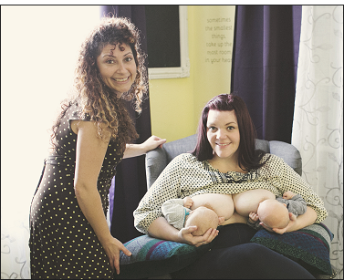 Breastfeeding mother nursing twins